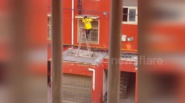 Deliveryman helps stranded boy crawl back home on high voltage electrical wires