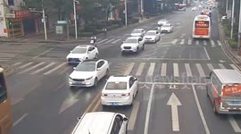 Teen girls crash motorbike into passing car after crossing red light