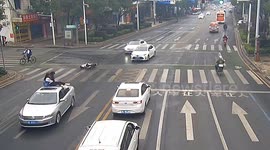 Chinese girls land on car roof after scooter collision