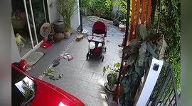 Pram flips over when toddler tries to climb on it