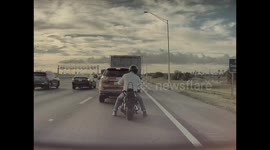 Biker Drops Firearm On Highway
