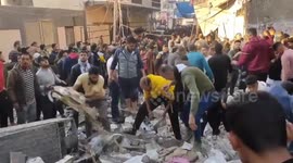 Rescuers look for survivors after dozens reported killed in resumed air strikes on Gaza