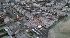Aerial footage of aftermath of fatal gas explosion at house in Baberton, Edinburgh, Scotland, UK.