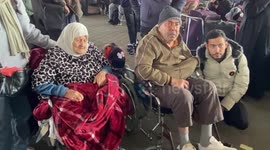 Palestinians with foreign passports wait for permission to leave Gaza, amid the ongoing conflict between Israel and Palestinian Islamist group Hamas,