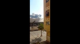 Apartment blocks in Gaza destroyed by Israeli missiles after end of ceasefire