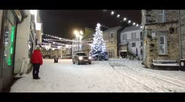 Heavy snow fall in Kendal, Cumbria, UK turns deserted roads into Christmas winter wonderlands