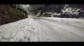 Heavy snow fall in Kendal, Cumbria, UK turns deserted roads into Christmas winter wonderlands