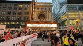 1000 Palestine supporters protest against Israel takes marches past popular Chicago Theater.