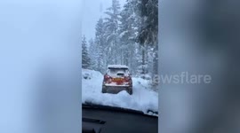 Family spend night in school with 100 other motorists stranded after heavy snowfall