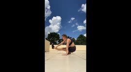 Acrobat Practices a Challenging Stunt