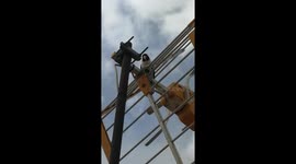 Man Makes Friends With a Bird on the Roof