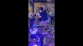 Korean tourists captivated by girl drummer's street performance