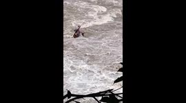 Angler swept away by raging floods while fishing in China