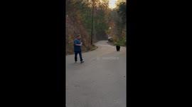 Man Unconcerned By Bear