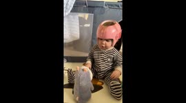Baby Stunned by Talking Hamster Toy