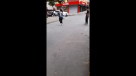 A cat with a dirty name tries to pick a fight with a different cat who comes to the workplace where he sleeps at night.