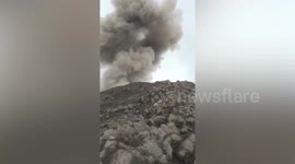 Rescue teams retrieve bodies of hikers killed in Indonesia volcano eruption