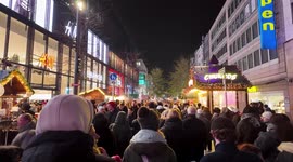 Walking on a crowded Christmas market in the German town of Dusseldorf