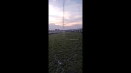 Mosquito tornadoes swirl along river bank in China