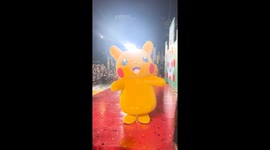 Pikachu mascots entertain shoppers at mall in Bangkok