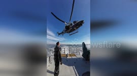 NYPD Officer Executes Daring Helicopter Descent onto Ship in New York, NY, USA