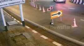Motorcycle rider plunges into uncovered manhole in Thailand