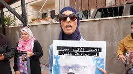 Families of Palestinian prisoners participate in a stand in solidarity with the prisoners in the Israeli prisons.