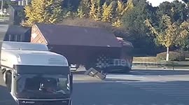 Motorists miraculously survive as container truck crushes car in China