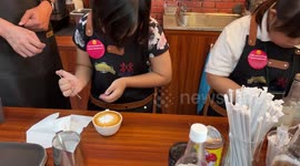 Cafe hires Down Syndrome workers in Jakarta, Indonesia