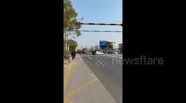 Electric car spirals endlessly around SUV post-collision in China