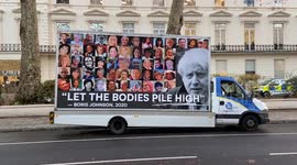 Protesters and bereaved family members gather as Boris Johnson arrives for the Covid-19 Inquiry