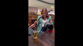 Lively ladies swap silly hats before embarking on fun-filled day trip to Manchester