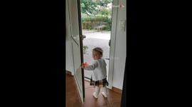 Adorable little lady is the happiest girl in town when daddy returns home from work