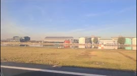 Clear Skies and City Sights: Stunning Aerial View of Stratford and Olympic Park After Takeoff from London City Airport