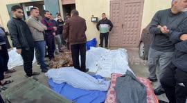 Palestinians hold funeral for relatives killed by Israeli strikes on Gaza's Deir al-Balah