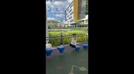 Determined toddler masters playground obstacle course