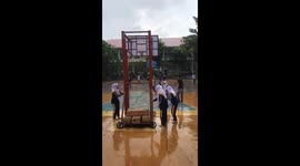 Wet field chronicles: laughter amidst drizzle as friends take a tumble