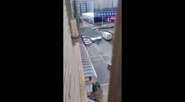 Massive cement pipe crushes parked cars after falling from semi-trailer