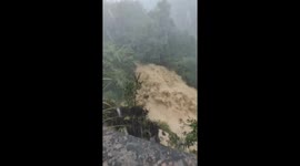 Mountain torrent surges during floods in China
