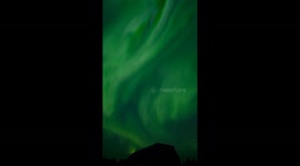 Aurora symphony: husky sleigh ride beneath Lapland's dazzling Northern Lights