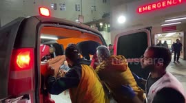 Injured Palestinians (includ children) are brought to a hospital following an Israeli strike in Dair El-Balah in the Central Gaza Strip.