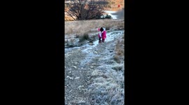 Little girl keeps falling on the frozen ground *Hilarious Video*
