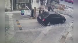 Carpark barrier knocks woman’s to the ground before her husband takes revenge