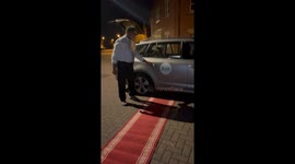 Uber driver rolls out literal red carpet for lady passengers