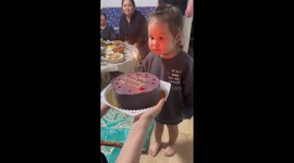 Birthday Girl Tries To Put Out A Candle With Her Eyes