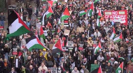 Bird's eye view of tens of thousands of Palestine supporters marching through central London