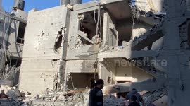Palestinians searche in the ruins of a building in the aftermath of an overnight Israeli bombing in Rafah. Israel carried out deadly bombardments in Gaza.