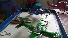 Artist makes model trucks and planes from used beer cans
