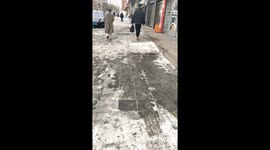 Winter stroll takes a slippery turn: icy mishap caught on camera in Heilongjiang, China