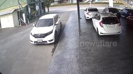 Funny moment man tries to stop 'ghost car' being pushed by another person from the back